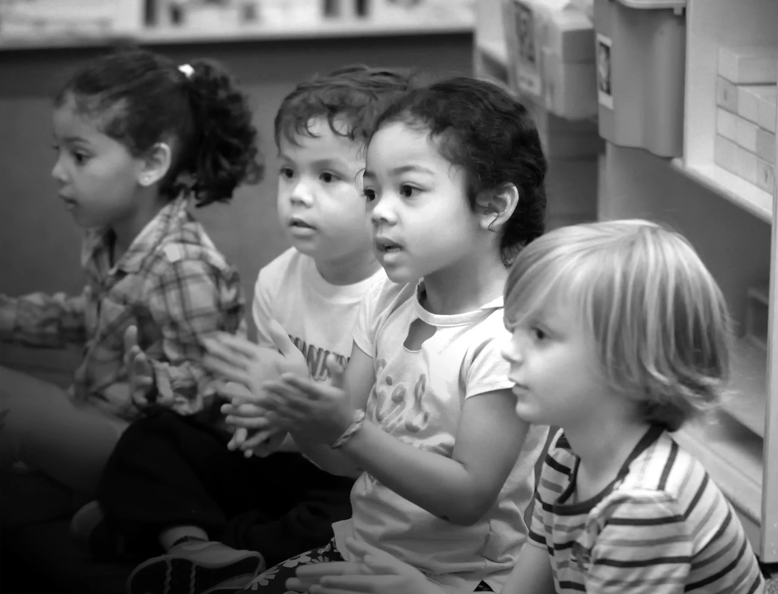 young children playing in a circle